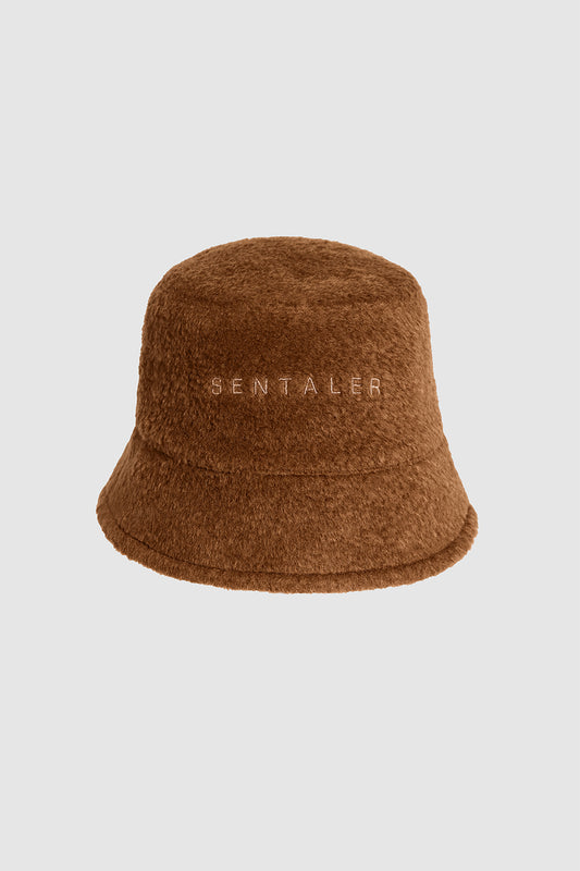 Sentaler Bouclé Alpaca Bucket Hat featured in Bouclé Alpaca and available in Caramel Café. Seen as off figure.