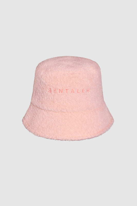 Sentaler Bouclé Alpaca Bucket Hat featured in Bouclé Alpaca and available in Pink Clay. Seen as off figure.