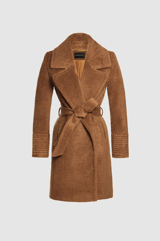 Sentaler Bouclé Alpaca Mid Length Notched Collar Wrap Coat featured in Bouclé Alpaca and available in Caramel Café. Seen as off figure belted.