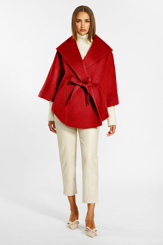 Sentaler Cape with Shawl Collar and Belt crafted in Baby Alpaca wool and in Scarlet Red. Seen from front on female model.