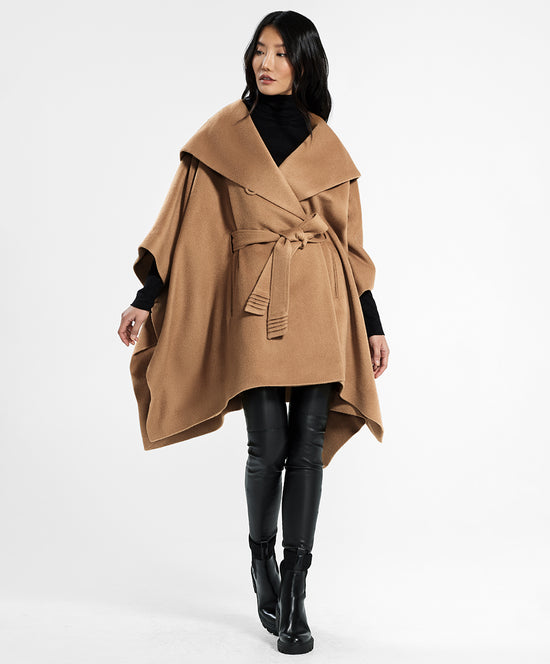 Sentaler Oversized Hooded Poncho with Belt featured in Baby Alpaca and available in Dark Camel. Seen from front on female model who is wearing the poncho belted.