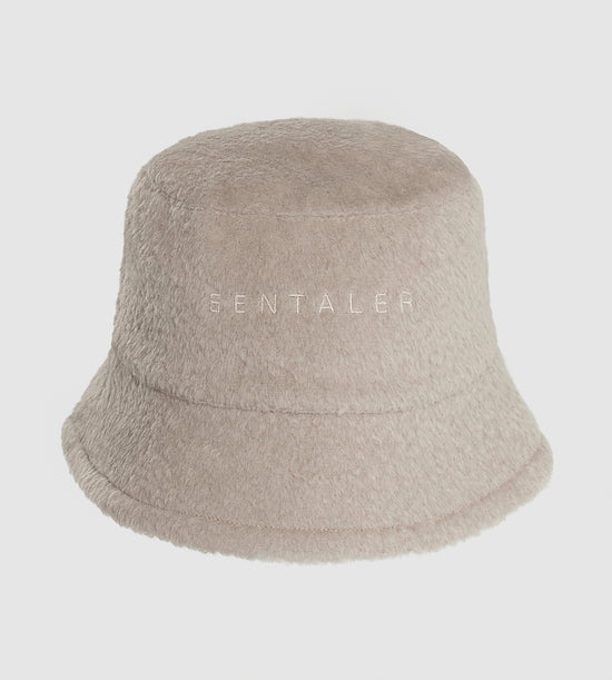 Sentaler Mens Bouclé Alpaca Bucket Hat featured in Bouclé Alpaca and available in Sand. Seen as off figure.