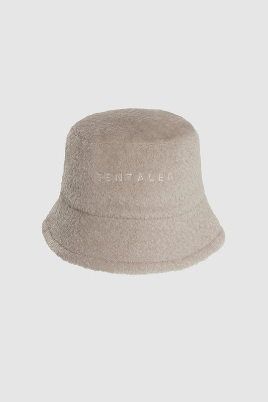 Sentaler Mens Bouclé Alpaca Bucket Hat featured in Bouclé Alpaca and available in Sand Neutral. Seen as off figure.