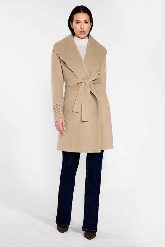 Sentaler Mid Length Shawl Collar Wrap Coat featured in Baby Alpaca and available in Camel. Seen from front on female model who is wearing the coat belted.