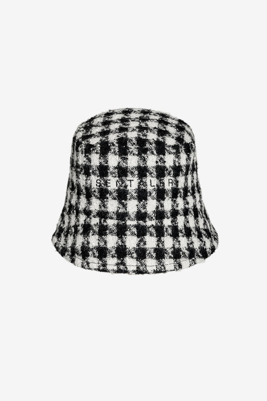 Sentaler Tweed Black and White Houndstooth Bucket Hat in Tweed Suri Alpaca wool. Seen as off figure.