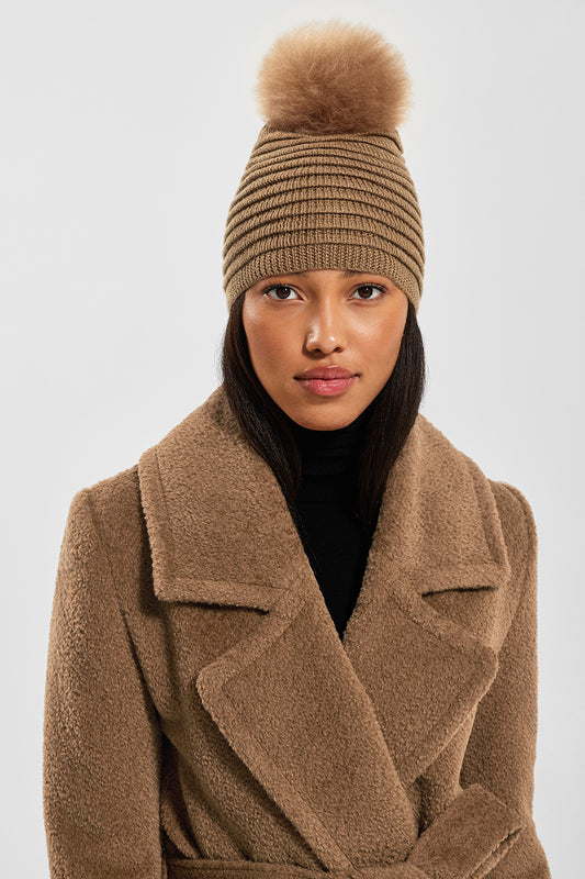 Sentaler Adult Ribbed Hat With Oversized Fur Pompon featured in Baby Alpaca and available in Dark Camel. Seen from front.