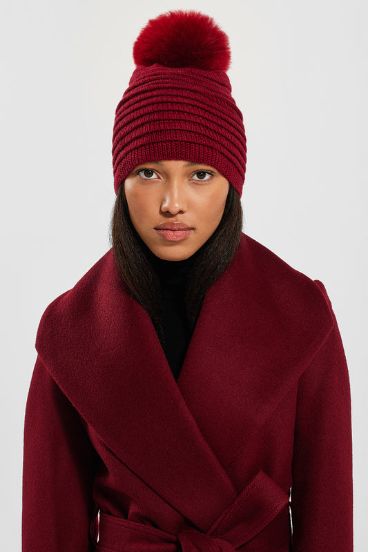 Sentaler Adult Ribbed Hat With Oversized Fur Pompon featured in Baby Alpaca and available in Garnet Red. Seen from front.