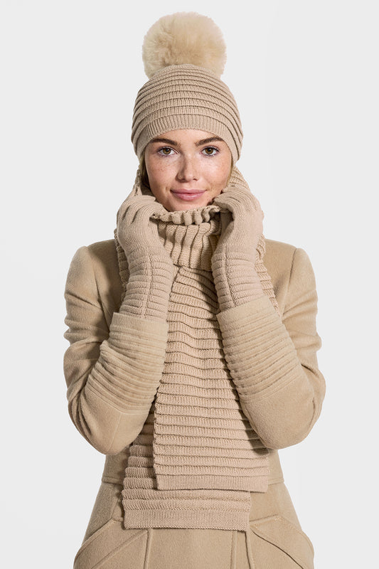 Sentaler Adult Ribbed Scarf, Ribbed Hat with Oversized Fur Pompon featured in Baby Alpaca and available in Camel. Seen from front on model.