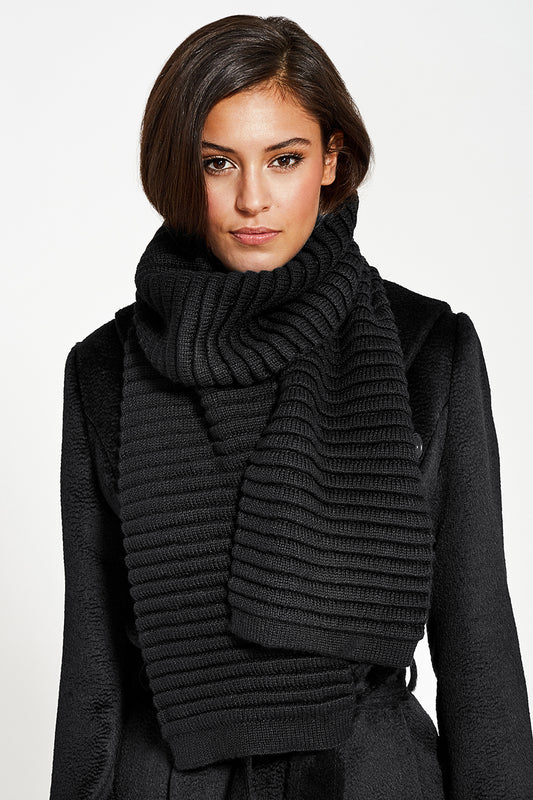 Sentaler Adult Ribbed Scarf featured in Baby Alpaca and available in Black. Seen from front on model.
