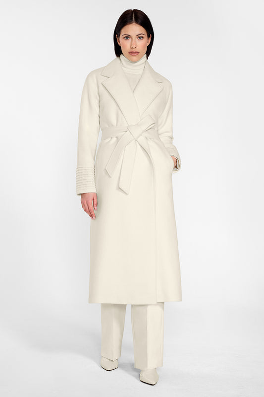 Sentaler Long Notched Collar Raglan Sleeve Wrap Coat featured in Baby Alpaca and available in Ivory. Seen from front on female model wearing the coat belted.