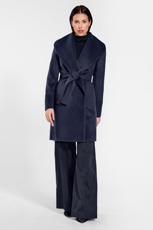 Sentaler Mid Length Shawl Collar Wrap Coat featured in Baby Alpaca and available in Deep Navy. Seen from front on female model who is wearing the coat belted.